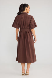 Model Genericm wearing size sample of the Leo Dress - Cocoa in colour Cocoa, from the front