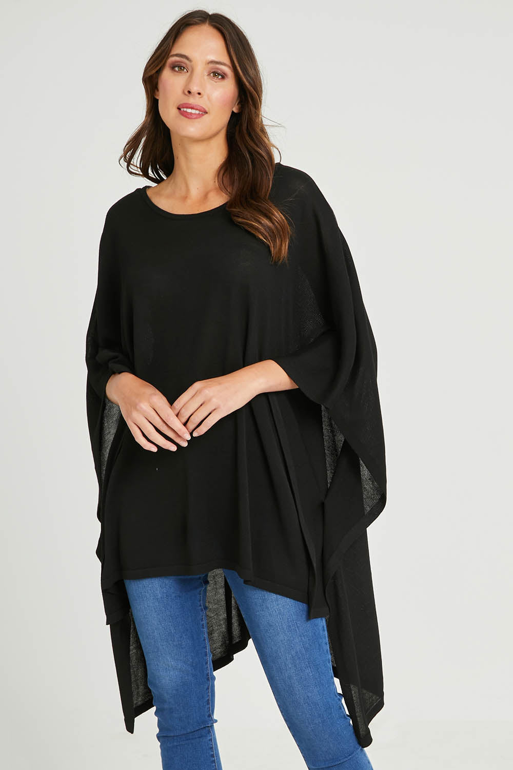 Model Madeline wearing size OneSize of the Vaasa Top in colour Black (Black), from the front, cropped image