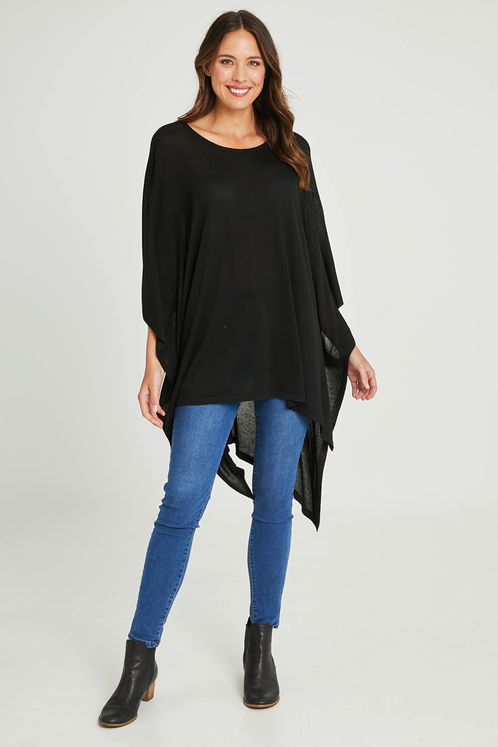Model Madeline wearing size OneSize of the Vaasa Top in colour Black (Black), from the front, showing the whole outfit