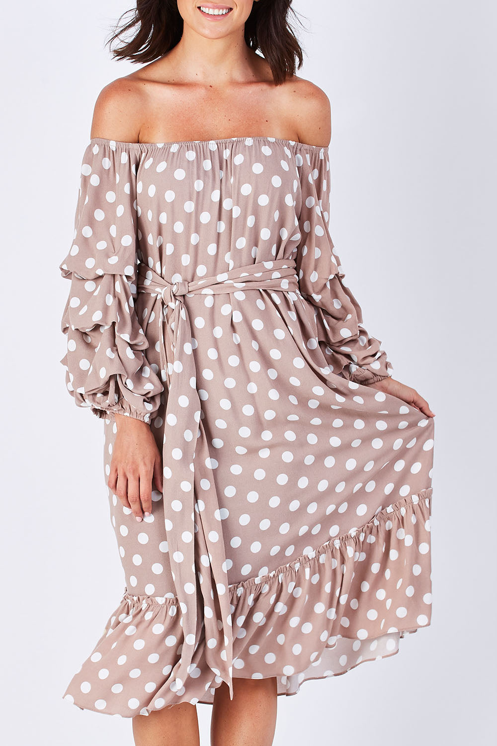 Model Perrie wearing size S-M of the Saloon Dress in colour BlushDot (Pink), from the front, cropped image