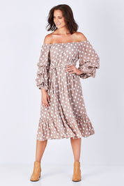 Model Perrie wearing size S-M of the Saloon Dress in colour BlushDot (Pink), from the front, showing the whole outfit