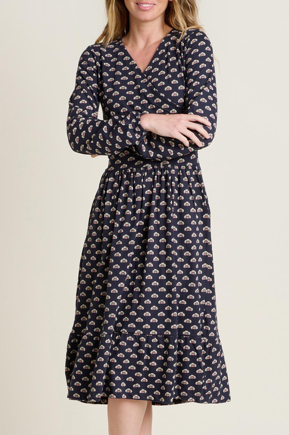 A model wearing the Annie Faux Wrap Cotton Dress in colour Navy (Blue), from the front, cropped image