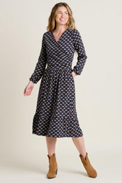 A model wearing the Annie Faux Wrap Cotton Dress in colour Navy (Blue), from the front, showing the whole outfit