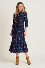 A model wearing the Maeve Maxi Cotton Corduroy Shirt Dress in colour Navy (Blue), from the front, showing the whole outfit