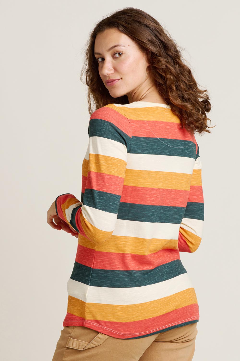 A model wearing the Stripe Long Sleeve Cotton Tee in colour Multi, from the back