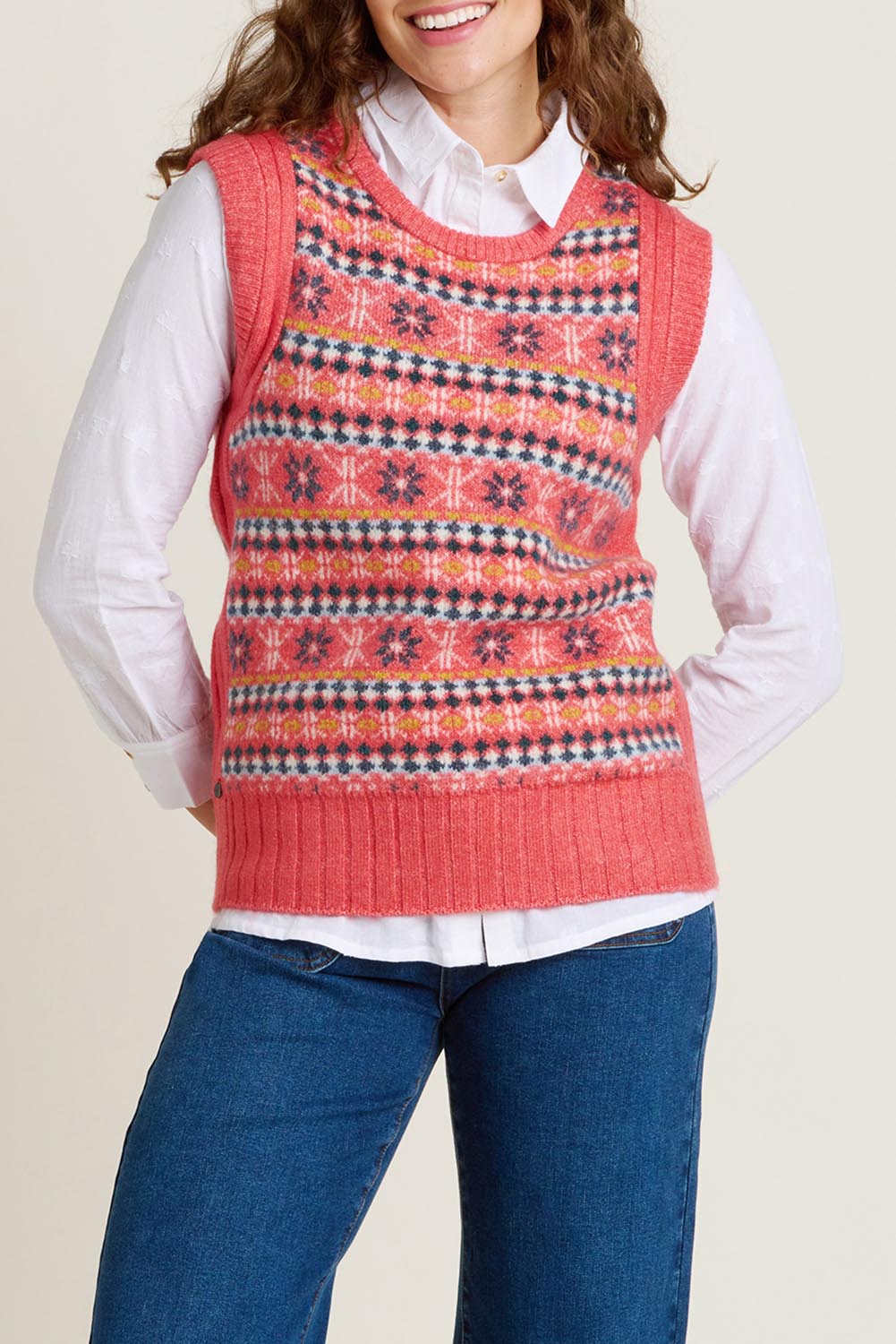 A model wearing the Pink Fairisle Knitted Vest in colour Red (Red), from the front, cropped image