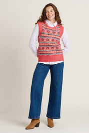 A model wearing the Pink Fairisle Knitted Vest in colour Red (Red), from the front, showing the whole outfit