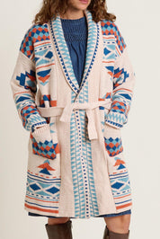 A model wearing the Geo Belted Wool Blend Knitted Cardigan in colour Multi, from the front, cropped image