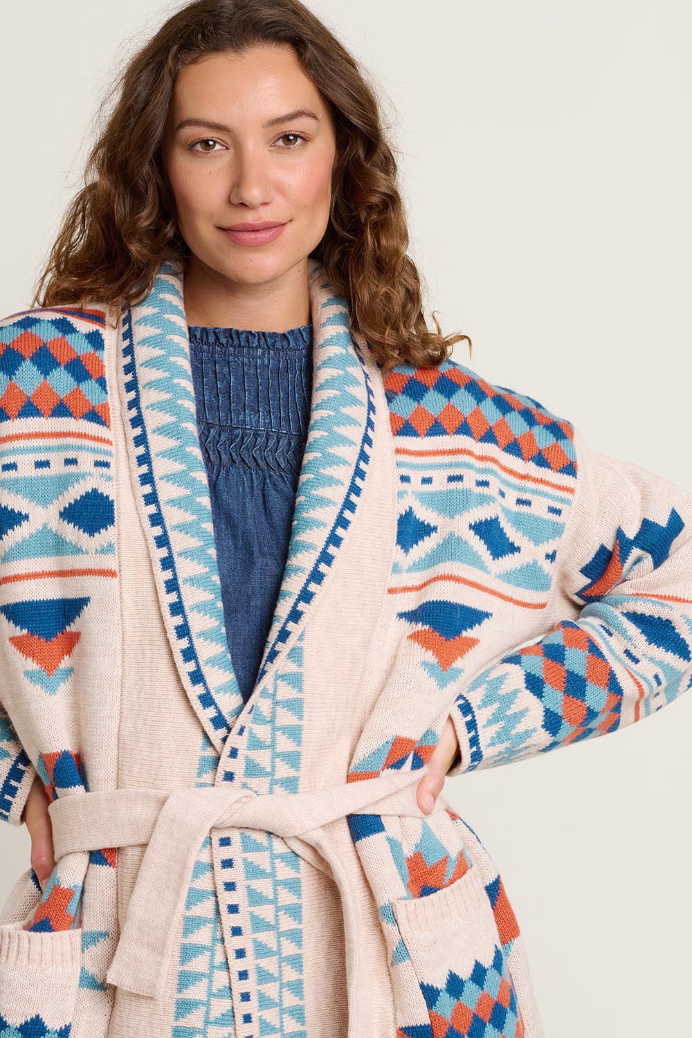 A model wearing the Geo Belted Wool Blend Knitted Cardigan in colour Multi, from the front, cropped image