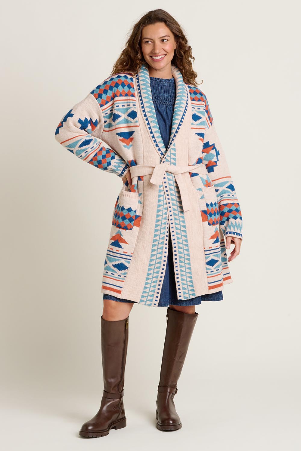 A model wearing the Geo Belted Wool Blend Knitted Cardigan in colour Multi, from the front, showing the whole outfit