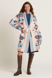 A model wearing the Geo Belted Wool Blend Knitted Cardigan in colour Multi, from the front, showing the whole outfit