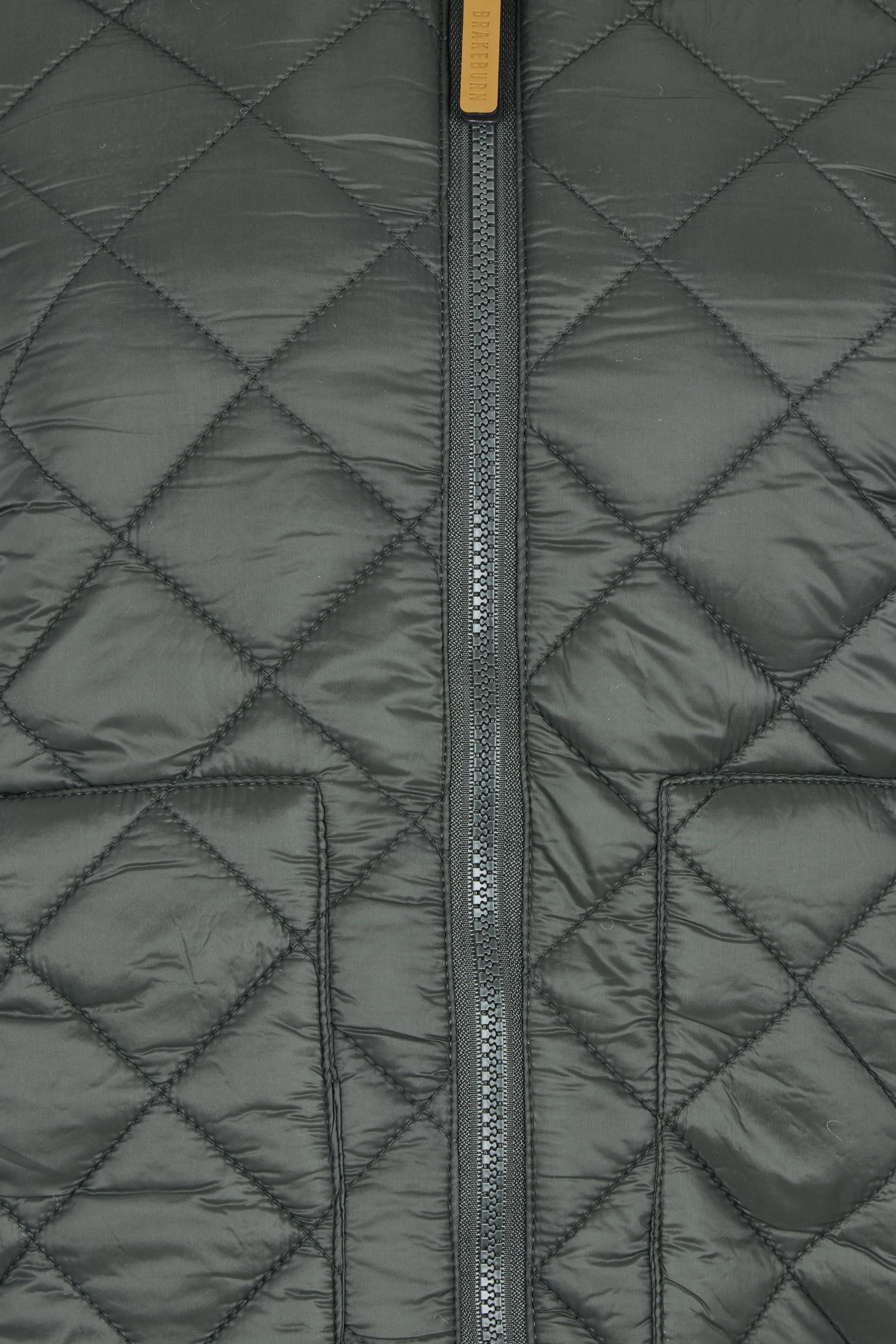 Product shot of the Fortunes Reversible Jacket in colour Multi (Green), detail