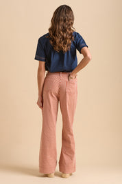 A model wearing the Stripe Straight Leg Jeans in colour Redwhite, from the back