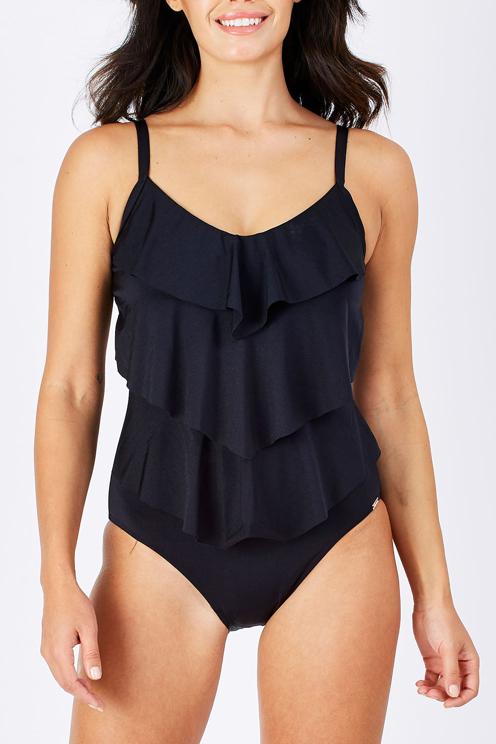Model Monika wearing size 10 of the 3 Tier One Piece in colour Black (Black), from the front, cropped image