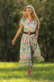 A model wearing the Mona Bluebell Cotton Dress in colour Mona, from the front, showing the whole outfit