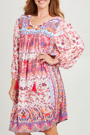 Model Katie wearing size S of the Sigrid Dress in colour Pink (Pink), from the front, cropped image