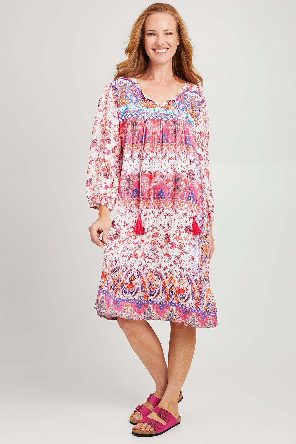 Model Katie wearing size S of the Sigrid Dress in colour Pink (Pink), from the front, showing the whole outfit