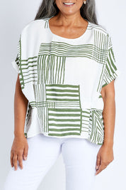 Model Nadine wearing size S of the Random Stripe Print Top in colour Khaki (Green), from the front, cropped image