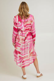 Model Grace wearing size S of the Cosmopolitan Dress in colour Pink (Pink), from the back