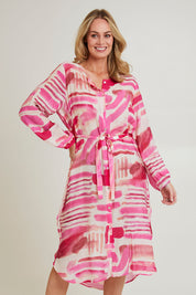 Model Grace wearing size S of the Cosmopolitan Dress in colour Pink (Pink), from the front, cropped image