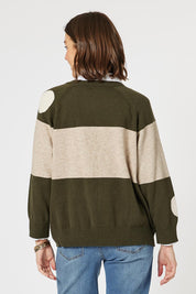 A model wearing the Moonlight Knit Jumper in colour Khaki (Green), from the back