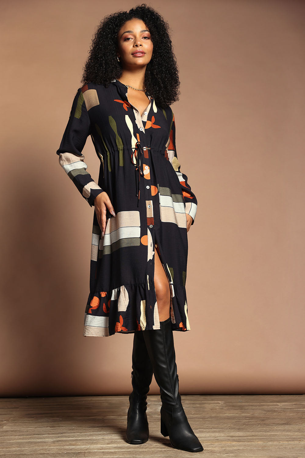 Model Ziara wearing size S of the Galleria Dress in colour Black (Black), from the front, showing the whole outfit