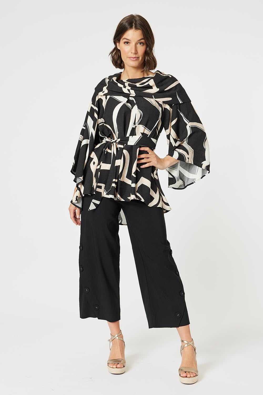 A model wearing the Matisse Top in colour Black (Black), from the front, showing the whole outfit