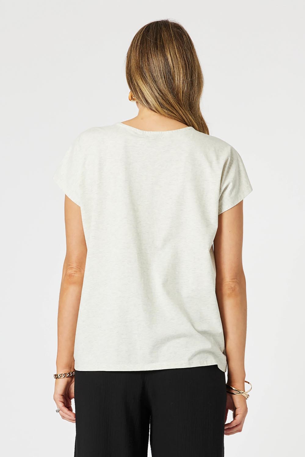 A model wearing the Cross Stitch Cotton Tee in colour Natural, from the back