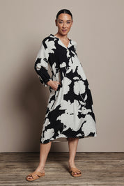 Model Katie wearing size S of the Barcelona Dress in colour Black, from the front, showing the whole outfit
