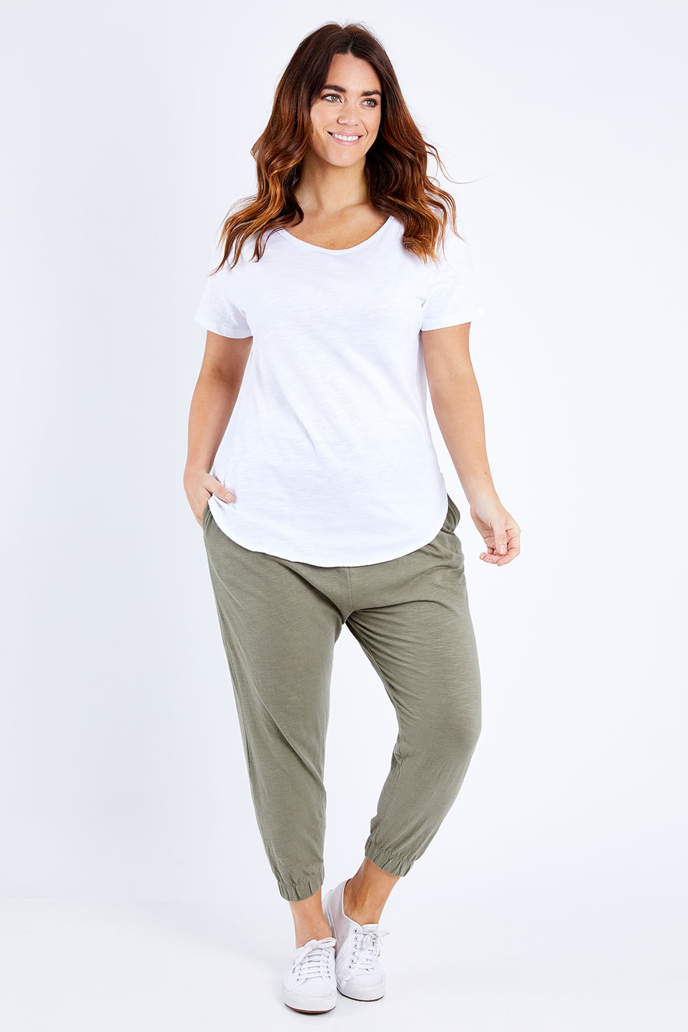 Model Laura wearing size M of the Organic Cotton Charlotte Tee in colour White (White), from the front, showing the whole outfit