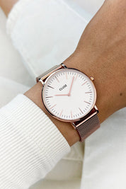 A model wearing the La Boheme Mesh Watch in colour RoseGoldW (Metallics), from the front, showing the whole outfit