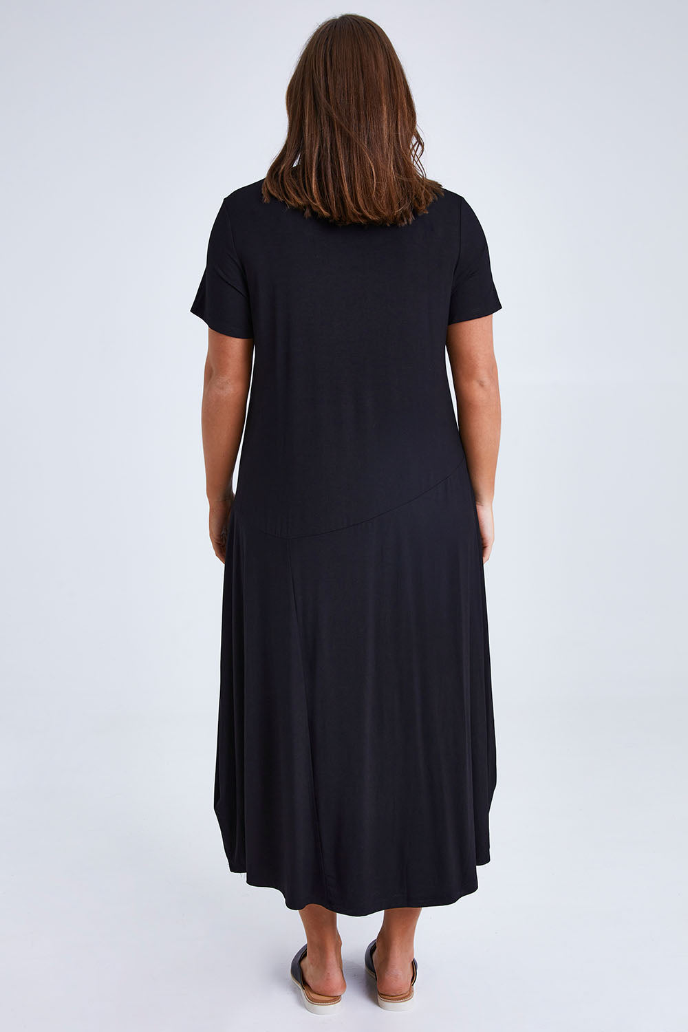 Model Monique wearing size 14 of the Summer Cotton Blend Pocket Dress in colour Black (Black), from the back