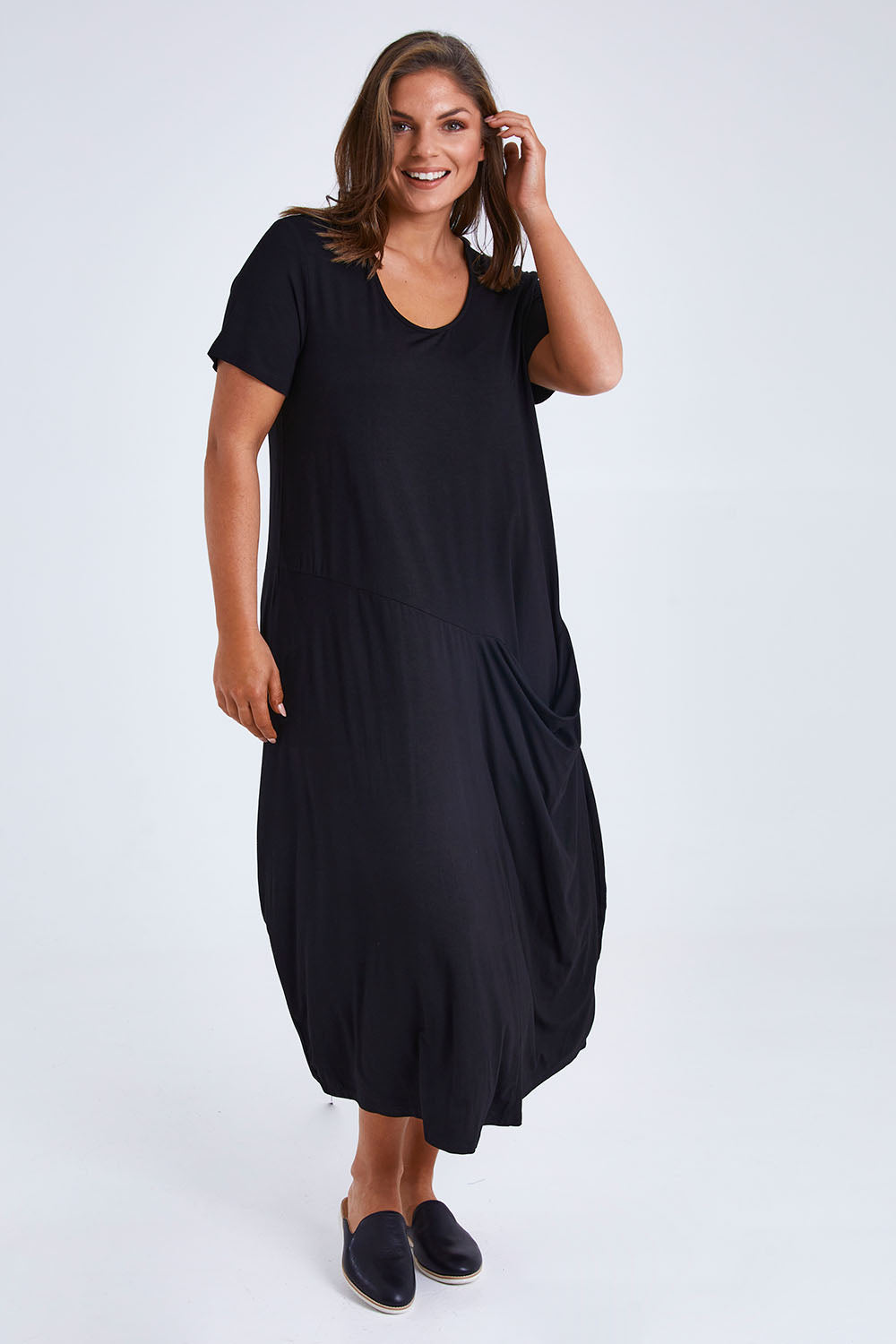 Model Monique wearing size 14 of the Summer Cotton Blend Pocket Dress in colour Black (Black), from the front, showing the whole outfit