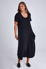 Model Monique wearing size 14 of the Summer Cotton Blend Pocket Dress in colour Black (Black), from the front, showing the whole outfit
