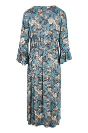 Product shot of the Gemma Ruffle Dress in colour Mint (Green), from the back