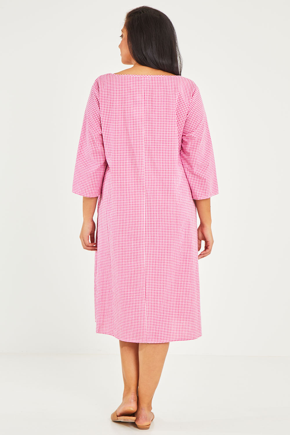 Model Terri-Leigh wearing size 14 of the Pocket Midi Dress in colour Pink (Pink), from the back