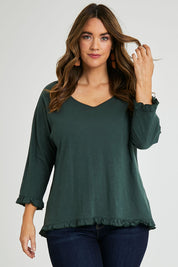 Model Laura wearing size 14 of the Ruffle 3/4 Sleeve Top in colour Forest (Green), from the front, cropped image
