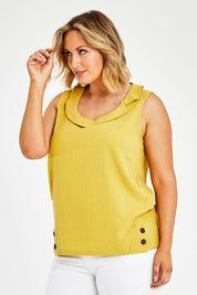 Model Jess wearing size 14 of the Upcycle Cowly Top in colour Sunflower, from the front, cropped image