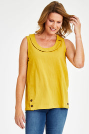 Model Naomi wearing size 10 of the Upcycle Cowly Top in colour Sunflower, from the front, cropped image