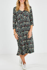 Model Kelly wearing size 10 of the Jessie 3/4 Sleeve Dress in colour Ditsy (Blue), from the front, cropped image