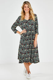 Model Kelly wearing size 10 of the Jessie 3/4 Sleeve Dress in colour Ditsy (Blue), from the front, showing the whole outfit
