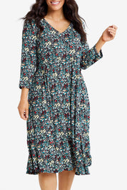 Model Laura wearing size 14 of the Jessie 3/4 Sleeve Dress in colour Ditsy (Blue), from the front, cropped image