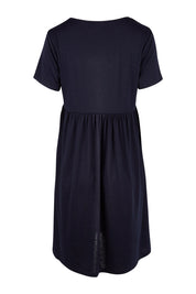 Product shot of the Short Sleeve Holiday Dress in colour Navy (Blue), from the back