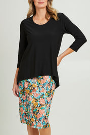 Model Grace wearing size 10 of the Forgiveness Long Dress in colour Blkfloral (Black), from the front, cropped image