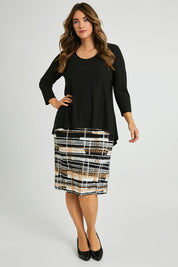 Model Laura wearing size 14 of the Forgiveness Long Dress in colour Camelblk (Black), from the front, showing the whole outfit