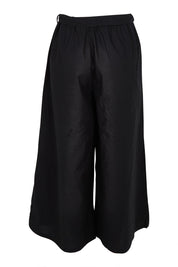 Product shot of the Swinging Pant in colour Black (Black), from the back
