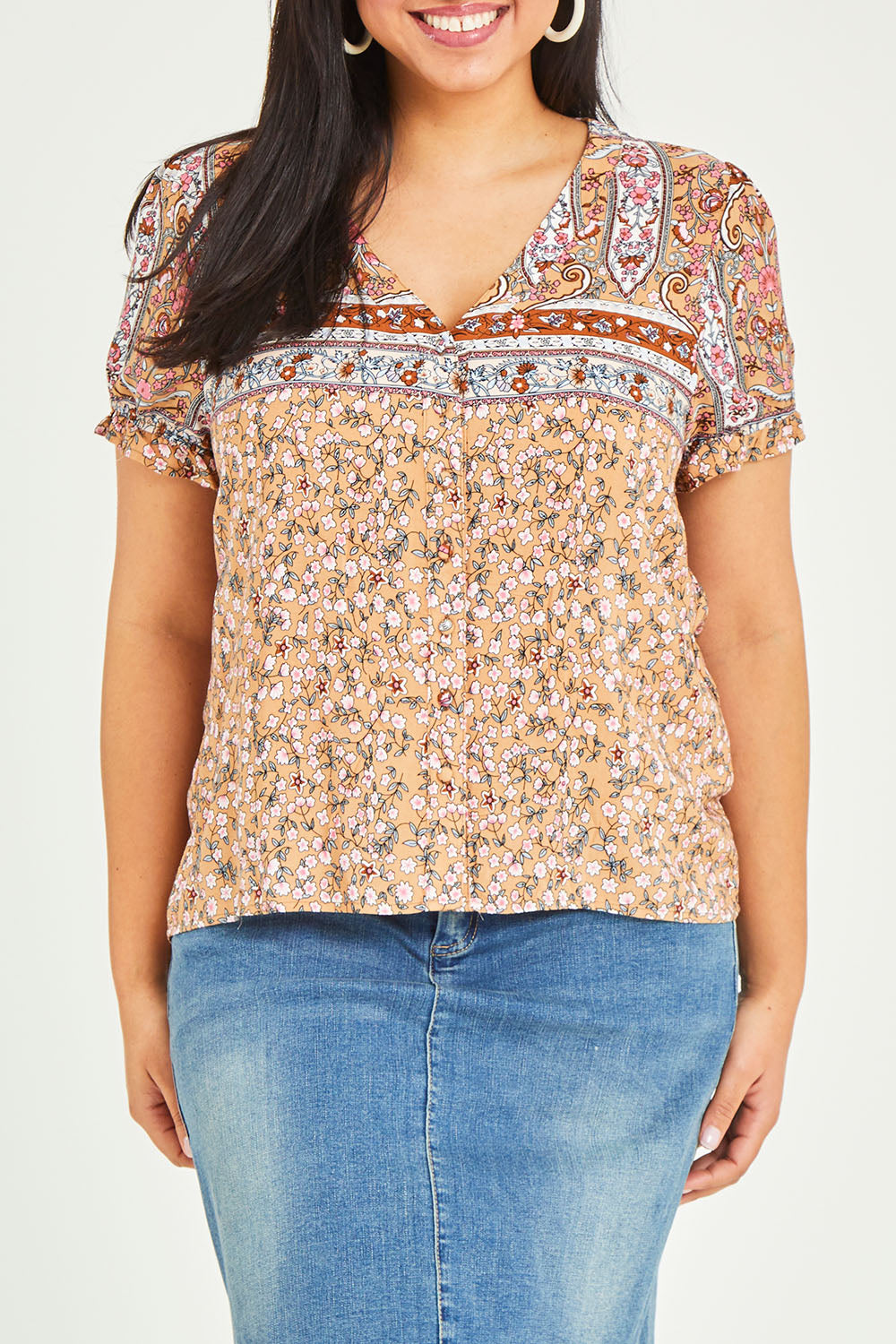 Model Terri-Leigh wearing size 14 of the Summer Top in colour Toffee, from the front, cropped image