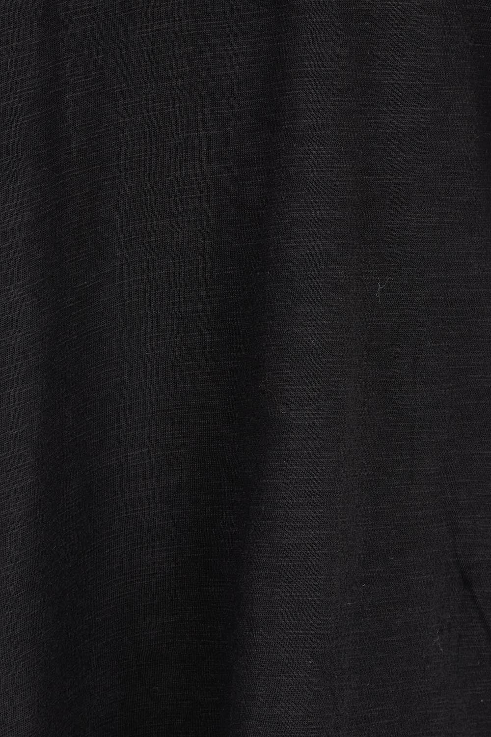 Product shot of the Ruffle Tee Top in colour Black (Black), detail