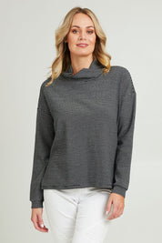 Model Grace wearing size 10 of the Oversized Loose Cowl Top in colour Black (Black), from the front, cropped image