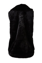Product shot of the Unreal Core Vest in colour Black (Black), from the back